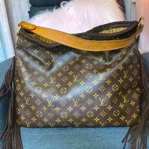 Authentic custom fringe Louis Vuitton Bag. One of a kind LV monogram bag.